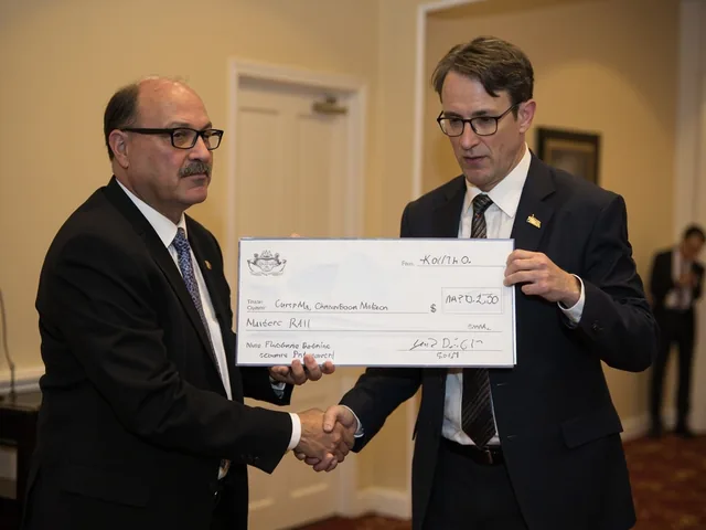 Prize money check presentation with winner handshake